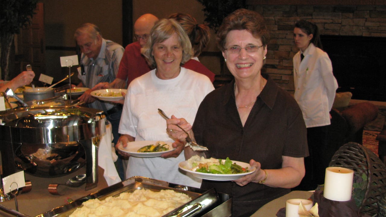 Trish and Marian in buffet line