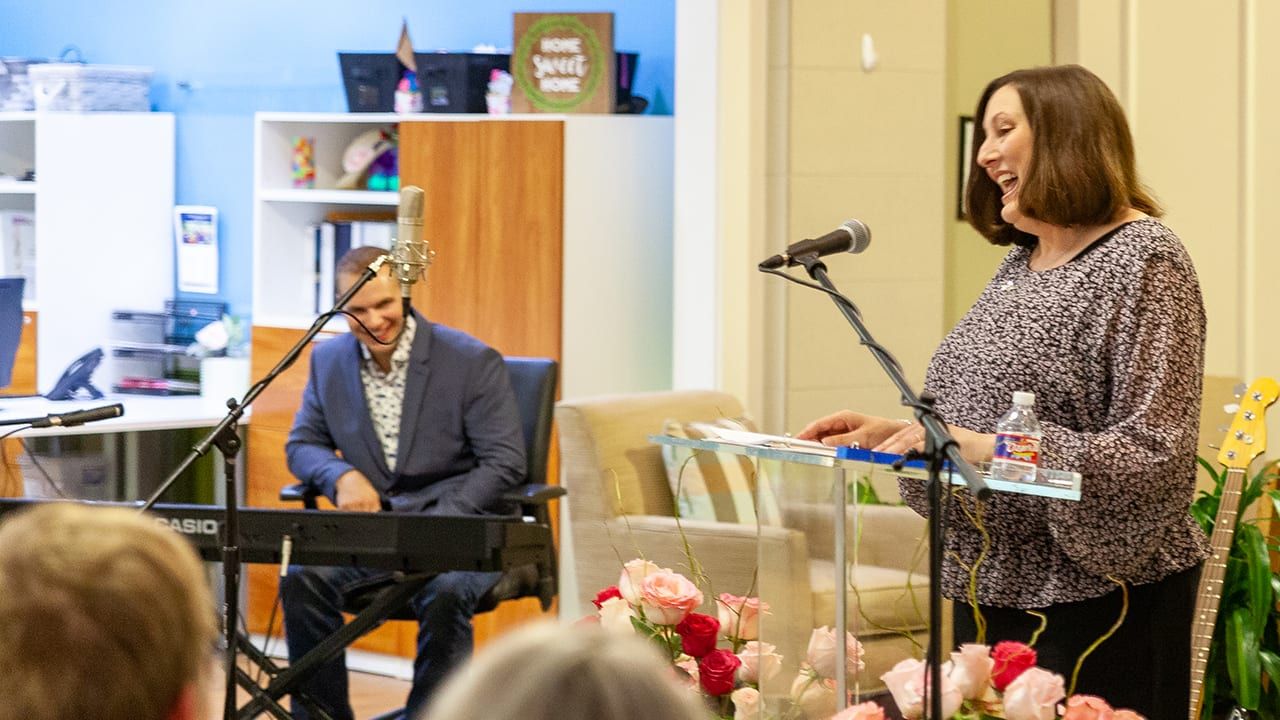 Sheryl speaking at Celebration of Life event