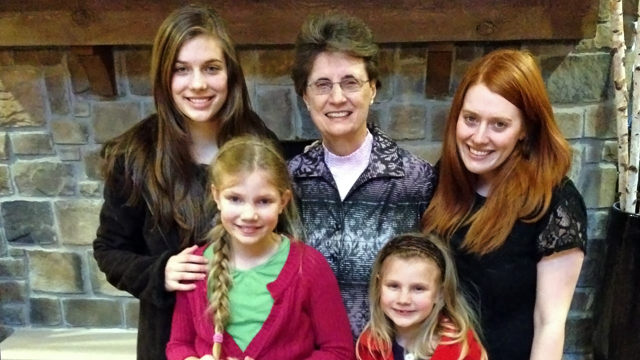 Grandmother with four granddaughters